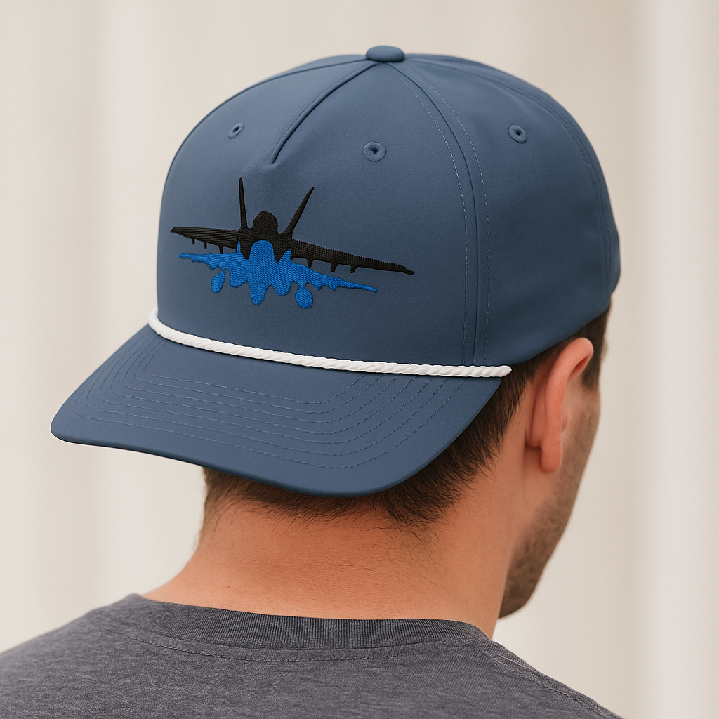 Another promotional image of person wearing navy blue fighter jet cap with face not visible