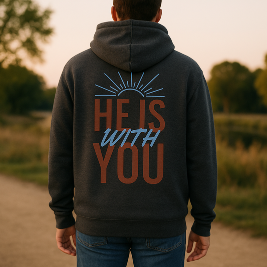 Promotional image of person wearing "HE IS WITH YOU" hoodie from behind at a distance